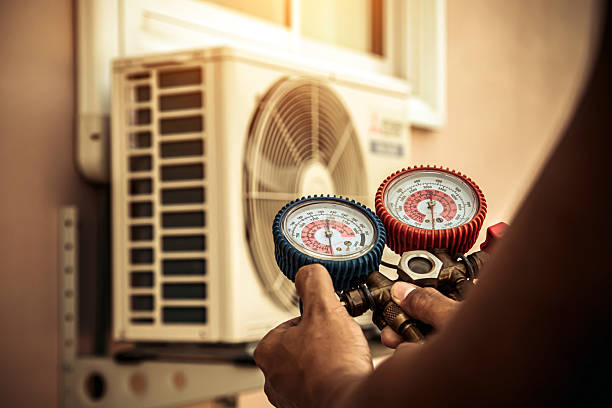 Professional Air Conditioning Service technician working in Chatfield, TX